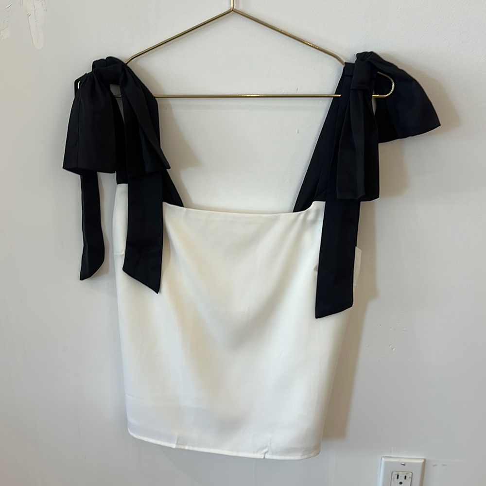Elegant White Top with Black Bow Straps